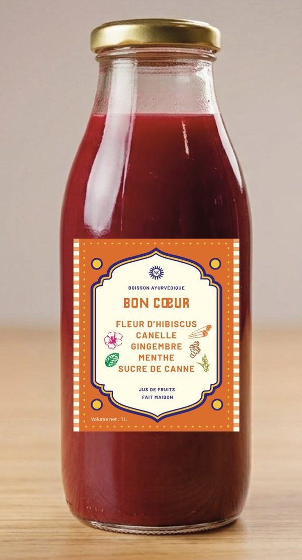 Bouteille de Bon Cœur, jus rouge, étiquette orange